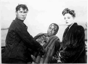 Photo showing, from L to R, John Hodiak, Canada Lee and Tallulah Bankhead, in a scene from the film 'Lifeboat', directed by Alfred Hitchcock.